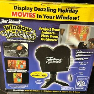 Star Shower Windiw Wonderland Display dazzling, Holiday movies in your window.